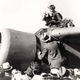 Earhart and her Vega are thronged with well-wishers on her arrival in Oakland (Hawai’i Aviation)